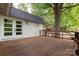 Relax on this beautiful wooden deck overlooking the yard, perfect for outdoor gatherings and leisurely afternoons at 16137 Tana Tea Cir, Tega Cay, SC 29708