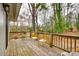 Relax on this private outdoor deck featuring decorative metal seating and natural landscaping at 16137 Tana Tea Cir, Tega Cay, SC 29708