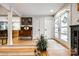 Welcoming entryway with hardwood floors and double doors leading outside at 16137 Tana Tea Cir, Tega Cay, SC 29708