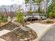 Charming single-story home with lush landscaping and a spacious driveway, perfect for enjoying the outdoors at 16137 Tana Tea Cir, Tega Cay, SC 29708