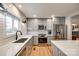 Modern kitchen with stainless steel appliances, ample counter space, and gray cabinets at 16137 Tana Tea Cir, Tega Cay, SC 29708