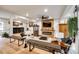 Spacious living room with hardwood floors, a modern fireplace, and stylish decor at 16137 Tana Tea Cir, Tega Cay, SC 29708
