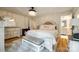 Spacious main bedroom features hardwood floors, neutral decor, and ensuite bathroom at 16137 Tana Tea Cir, Tega Cay, SC 29708