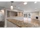 Spacious basement with a granite bar, perfect for entertaining and access to the lake at 170 W Maranta Rd, Mooresville, NC 28117