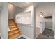 Finished basement with a bar area, fireplace, and stairs leading to the main level at 170 W Maranta Rd, Mooresville, NC 28117