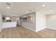 Finished basement featuring stylish bar area, wood floors, and neutral walls, ready for entertainment at 170 W Maranta Rd, Mooresville, NC 28117