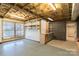 Unfinished basement space with exposed ceiling, shelving, and storage space at 170 W Maranta Rd, Mooresville, NC 28117