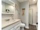 Nautical themed bathroom featuring a vanity with sink, toilet, and glass shower, complete with decor at 170 W Maranta Rd, Mooresville, NC 28117