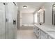 Bathroom with glass shower, soaking tub, and modern vanity at 170 W Maranta Rd, Mooresville, NC 28117