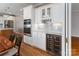 Bright kitchen features stainless steel appliances, gray backsplash, and hardwood flooring at 170 W Maranta Rd, Mooresville, NC 28117