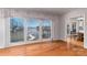 Living room with water view, wood floors, and natural lighting at 170 W Maranta Rd, Mooresville, NC 28117