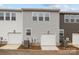 New construction townhomes with individual garages and modern exteriors at 2013 Near Point Rd # 20, Charlotte, NC 28208