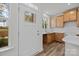 Bright kitchen showcasing wooden cabinets, white countertops, stainless sink, and modern finishes at 2013 Near Point Rd # 20, Charlotte, NC 28208