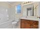 Bathroom featuring a vanity, toilet, and shower at 2107 Summerfield Cir, Conover, NC 28613