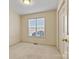 Bright bedroom featuring a large window and closet at 2107 Summerfield Cir, Conover, NC 28613