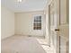 Bedroom features neutral walls, carpet and a window allowing for natural light at 2107 Summerfield Cir, Conover, NC 28613