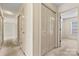 Hallway with neutral walls and carpet leading to rooms at 2107 Summerfield Cir, Conover, NC 28613
