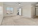 Neutral living room featuring a ceiling fan and access to the outdoors at 2107 Summerfield Cir, Conover, NC 28613