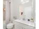 Well-lit bathroom featuring a vanity, toilet, shower and modern fixtures at 2311 Doby Creek Ln, Charlotte, NC 28262