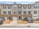 Charming townhome with stone accents, two-car garage, and inviting curb appeal at 2311 Doby Creek Ln, Charlotte, NC 28262