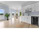 Bright dining area featuring a chandelier, breakfast bar and lakeside views at 249 Blue Heron Dr, Rock Hill, SC 29732