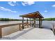 Covered dock with boat lifts providing direct access to the tranquil lake waters at 249 Blue Heron Dr, Rock Hill, SC 29732