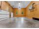 Spacious garage with a basketball hoop and multiple car parking spots at 249 Blue Heron Dr, Rock Hill, SC 29732