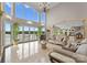 Elegant living room featuring lake views, neutral color palette, with high ceilings and natural light at 249 Blue Heron Dr, Rock Hill, SC 29732