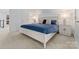 Spacious bedroom featuring a plush bed, side tables, and neutral carpeting at 2701 Sharon Rd, Charlotte, NC 28211