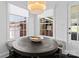 Cozy breakfast nook with built-in benches and natural light at 2701 Sharon Rd, Charlotte, NC 28211