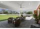 The backyard features a covered patio and a dining area, perfect for outdoor entertaining and gatherings at 2701 Sharon Rd, Charlotte, NC 28211