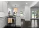 Bright kitchen with modern appliances and backyard access at 2701 Sharon Rd, Charlotte, NC 28211