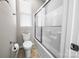 Clean bathroom featuring tub-shower, toilet, and window for natural light at 2914 Hiddenbrook Way, Indian Land, SC 29707