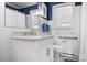 Classic bathroom with white tiled walls, marble countertop, and modern fixtures, designed for accessibility at 329 N Oakwood Dr, Statesville, NC 28677