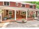 Covered patio featuring comfortable seating and stone pavers at 329 N Oakwood Dr, Statesville, NC 28677