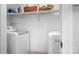 Functional laundry room with modern appliances and ample storage, offering convenience and efficiency at 329 N Oakwood Dr, Statesville, NC 28677