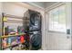 Convenient laundry area featuring a stacked washer and dryer set for efficient space usage at 3430 Olde Oak Ln, Gastonia, NC 28056