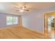 Bright and airy living room featuring hardwood floors and plenty of natural light from large windows at 3430 Olde Oak Ln, Gastonia, NC 28056