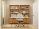 Comfortable office with white chair, desk, wooden cabinet with shelves, and large window at 4116 Camden Glen Rd, Lancaster, SC 29720