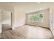 Open bedroom featuring three windows and an attached door at 4134 Camden Glen Rd, Lancaster, SC 29720