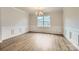 Dining room featuring modern trim, luxury vinyl plank flooring, and natural light at 4134 Camden Glen Rd, Lancaster, SC 29720