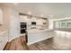 Spacious kitchen with white cabinets, an island, and stainless steel appliances at 4134 Camden Glen Rd, Lancaster, SC 29720