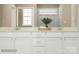 Bright bathroom with double vanity, sleek white cabinetry, and contemporary finishes at 4138 Camden Glen Rd, Lancaster, SC 29720