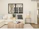 This modern living room showcases a comfortable sectional sofa and a striking geometric mirror at 4138 Camden Glen Rd, Lancaster, SC 29720