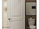 Elegant bathroom featuring a toilet, artwork, and open shelving for a bright and modern design at 4144 Camden Glen Rd, Lancaster, SC 29720
