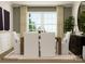 Cozy dining area featuring modern furnishings, neutral colors, and a view to the outdoors at 4144 Camden Glen Rd, Lancaster, SC 29720
