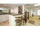 Basement featuring a wet bar, staircase, and patio access at 419 Park Ridge Rd, Albemarle, NC 28001