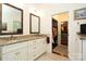 Bathroom featuring double sinks, granite countertops, modern fixtures and a large vanity at 419 Park Ridge Rd, Albemarle, NC 28001