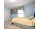 Comfortable bedroom featuring a bed and large windows at 419 Park Ridge Rd, Albemarle, NC 28001