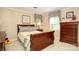 Cozy bedroom with a classic bed frame, ample natural light, and a neutral color palette at 419 Park Ridge Rd, Albemarle, NC 28001